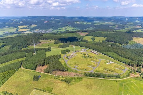 Aerial photo, Buchhagen mountain and wind turbine, former Nike fire control centre, now training