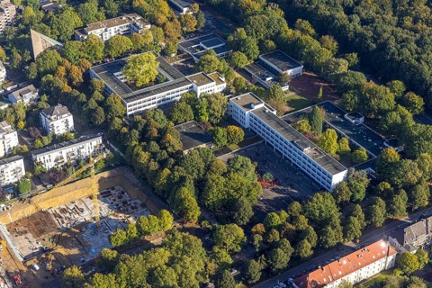 Aerial view, Max-Planck-Gymnasium and construction site with new building for multi-family houses
