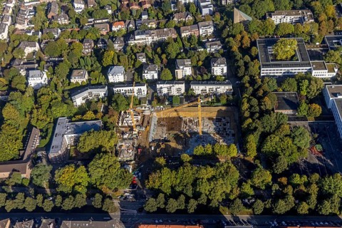 Aerial view, construction site with new building for multi-family houses at the former district