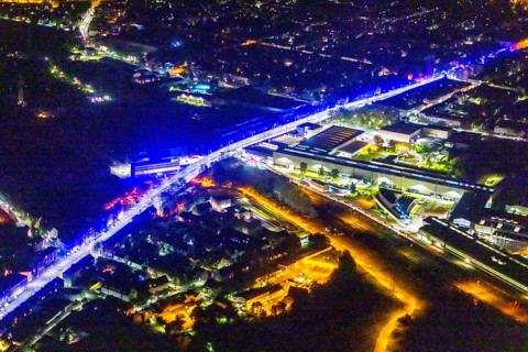 Aerial view, lighting in Schalke blue, Schalke 04, Kurt-Schumacher Straße with thyssenkrupp