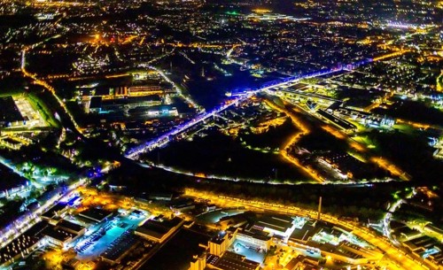 Aerial view, lighting in Schalke blue, Schalke 04, Kurt-Schumacher Straße with thyssenkrupp