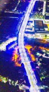 Aerial view, lighting in Schalke blue, Schalke 04, Kurt-Schumacher Straße with thyssenkrupp