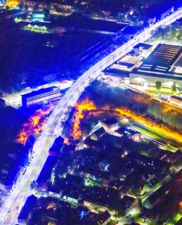 Aerial view, lighting in Schalke blue, Schalke 04, Kurt-Schumacher Straße with thyssenkrupp