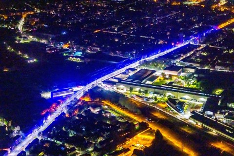 Aerial view, lighting in Schalke blue, Schalke 04, Kurt-Schumacher Straße with thyssenkrupp