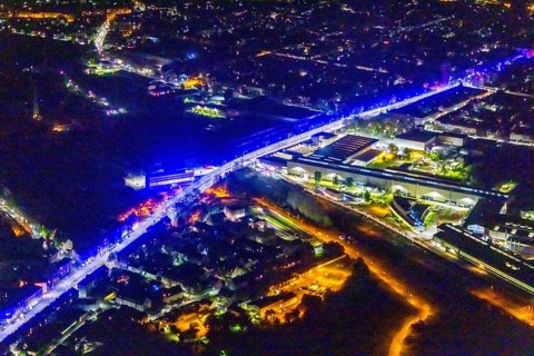 Aerial view, lighting in Schalke blue, Schalke 04, Kurt-Schumacher Straße with thyssenkrupp