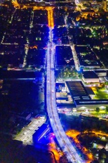 Aerial view, illumination in Schalke blue, Schalke 04, Kurt-Schumacher Straße with thyssenkrupp
