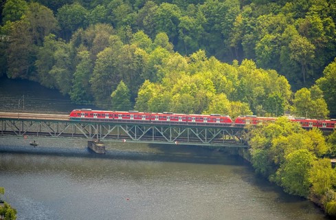 Aerial view, river Ruhr and suburban railway on the railway bridge Kettwig, Kettwig, Essen, Ruhr