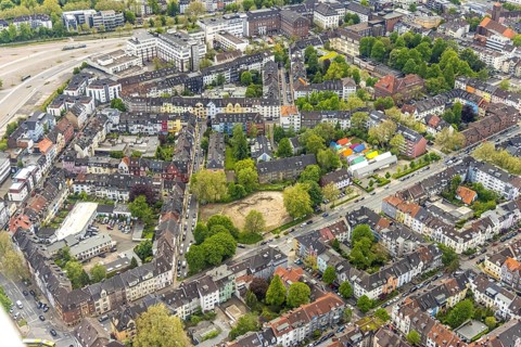 Aerial view, fallow land at Franziskastraße, catholic kindergarten St. Ludgerus with colourful