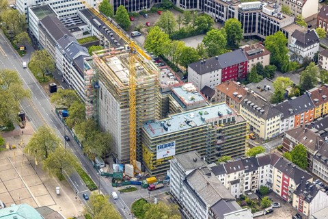 Aerial view, construction site, new building complex with residential tower and senior citizens'