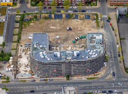 Aerial view, construction site and new office building on the corner of Frohnhauser Straße and