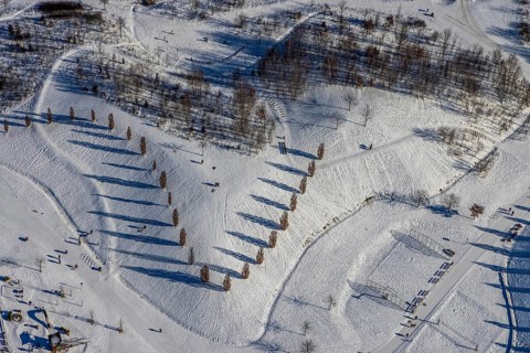 Aerial view, shadow play in snow-covered Krupp Park, Altendorf, Essen, Ruhr area, North
