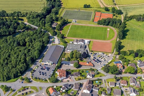 Aerial view, Edeka supermarket local supply centre, sports field Niederense, Hubertushalle