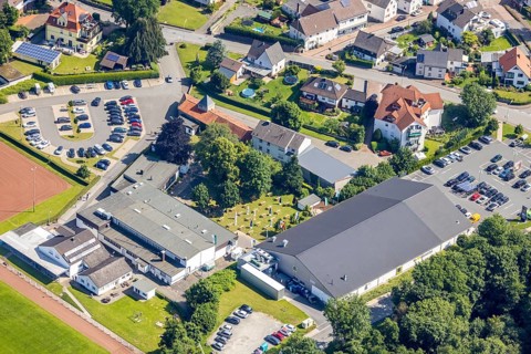 Aerial view, Hubertushalle Schützenverein, garden with beer tables and flags, Niederense, Ense,