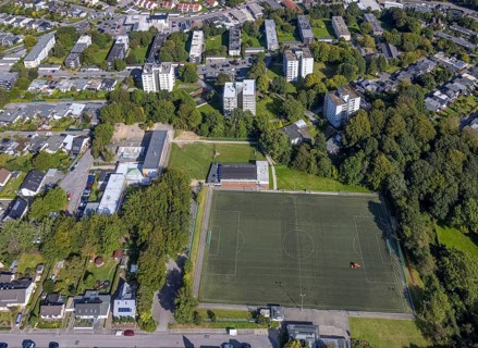Aerial view, sports field sports club Büttenberg 1930 and primary school Büttenberg in the district