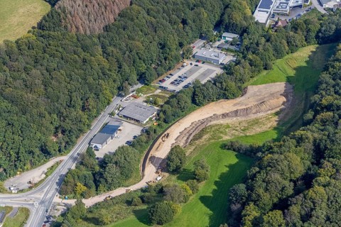 Aerial view, construction site with construction road at Hagener Straße at Febi car park in the