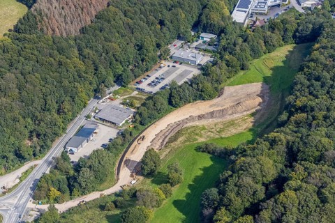 Aerial view, construction site with construction road at Hagener Straße at Febi car park in the