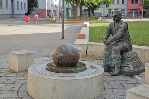 Monument to founder David Strickermann, town history on the development of the textile industry,