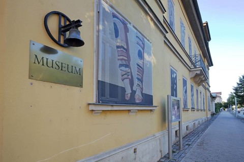 Bell museum building with inscription and banner, bell, town museum, GlockenStadtMuseum, Apolda,