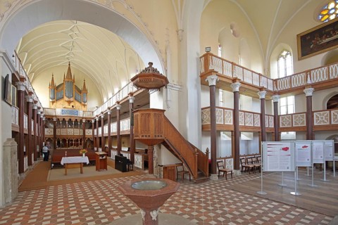 Organ, baptismal font, pulpit with pulpit bonnet, gallery, interior view of the neo-Gothic St