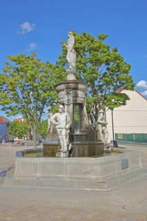 Market fountain with allegorical sculptures on the town's history, market square, Schönebeck,