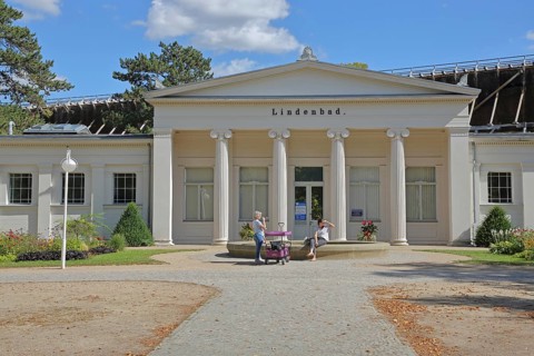 Classicist lime tree bath with columns, pedestrian, brine park, spa gardens, Bad Salzelmen,