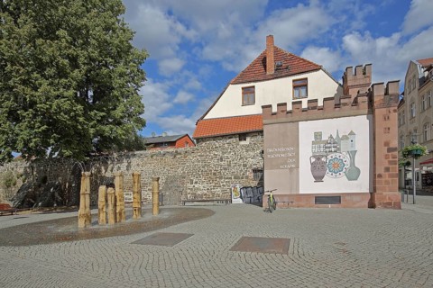Historic Hague Gate and part of the former town wall, fountain, Haldensleben, Saxony-Anhalt,