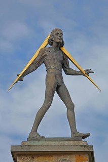 Sculpture Adam Olearius 1599-1671 Measures the World by Bernd Göbel 2010, monument to the medieval
