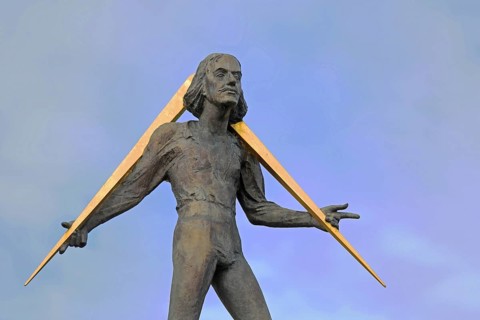 Sculpture Adam Olearius 1599-1671 Measures the World by Bernd Göbel 2010, monument to the medieval
