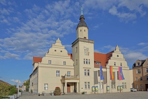 Renaissance town hall with EU flag, German national flag and town flag, three, flags, Coswig,