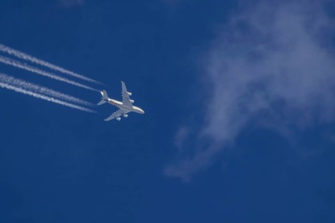 Aircraft in the sky at cruising altitude. Airbus A380 of the airline Ethihad en route to Abu Dhabi.
