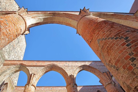 Interior view of the St Bartholomäi church ruins, view upwards, open, archways, columns, pillars,