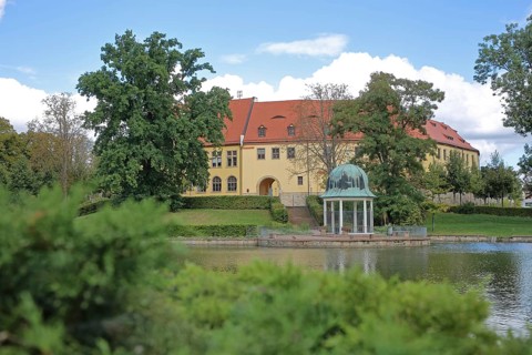 Castle and round pavilion at the spa gardens pond, Goethe School, Goethepark, Bad Lauchstädt,