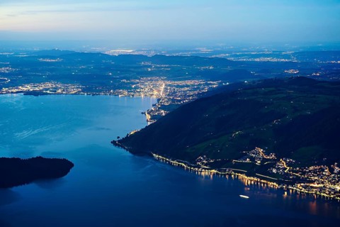 View from Rigi Kulm to the sea of lights with Lake Zug and the Kiemen, Walchwil, Canton Zug,