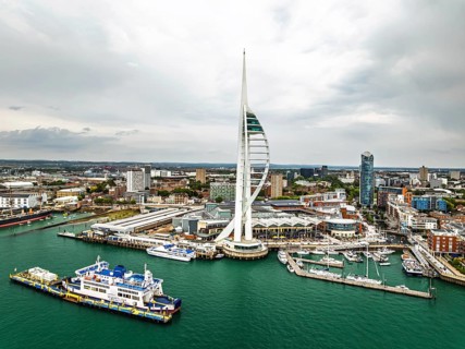 Portsmouth Harbour over Spinnaker Tower from a drone, Portsmouth, Gosport, England, United Kingdom