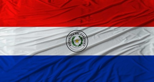 Close up of Paraguay flag waving. Flag of Paraguay with cloth texture