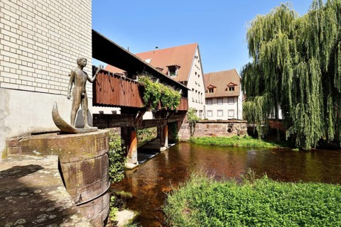 Ettlingen, Germany - August 13th 2025: Historic old town of Ettlingen Germany with wooden bridge