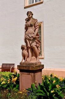 Ettlingen, Germany - August 2025: Sculpture of hunting goddess Diana in the castle garden of