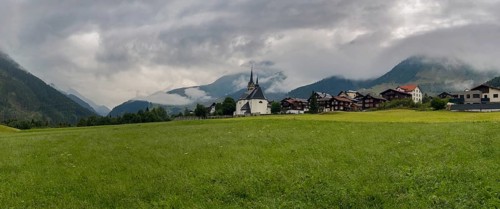Village panorama Sedrun with view to the Oberalp Pass, Tujetsch, Surselva, Grisons, Switzerland