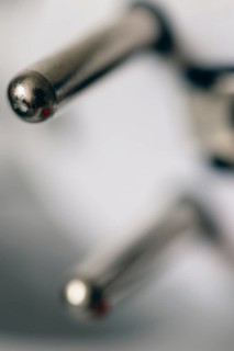 Close-up of a power plug, Schuko plug, with focus on the contact pins, symbol image for,