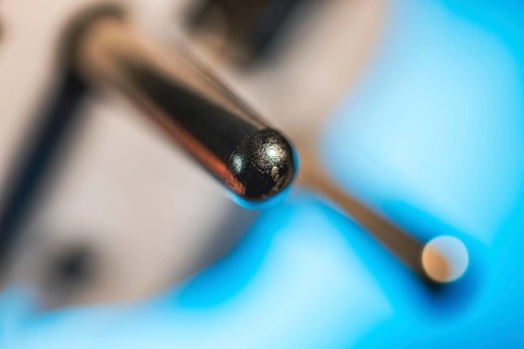 Close-up of a power plug, Schuko plug, with focus on the contact pins, symbol image for,