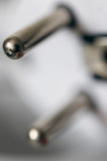 Close-up of a power plug, Schuko plug, with focus on the contact pins, symbol image for,