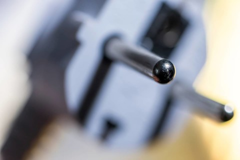 Close-up of a power plug, Schuko plug, with focus on the contact pins, symbol image for,