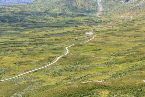 Gravel road through Jotunheimen National Park, view from Smørkollen mountain, Beitostølen,