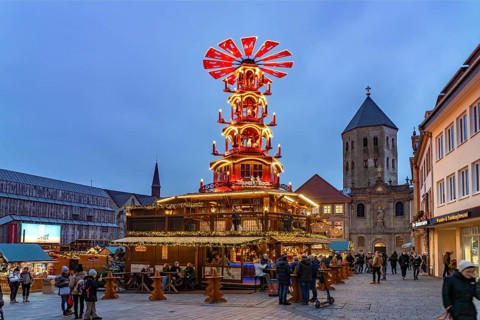 Christmas pyramid at the Paderborn Christmas market at dusk, Paderborn, North Rhine-Westphalia,