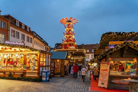Christmas pyramid at the Paderborn Christmas market at dusk, Paderborn, North Rhine-Westphalia,