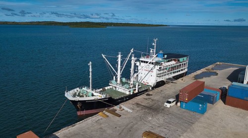 Ferry and supply vessel freighter Micronesian Navigators moored in the harbour of Colonia capital