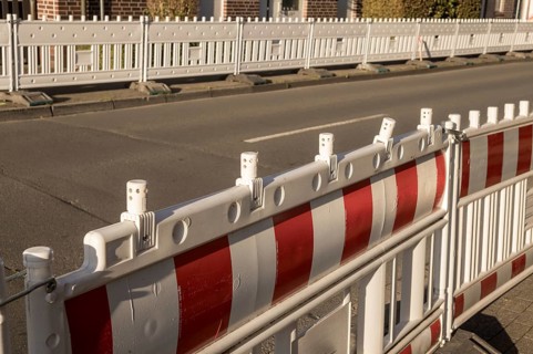 Borken, NRW, Germany, Red and white plastic roadblock securing a construction site, ensuring safety