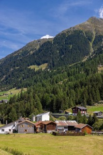 Hamlet with chapel of St James the Elder, Acla, Curaglia, Val Medel, Graubünden, Switzerland