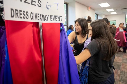 Detroit, Michigan USA - 13 September 2025 - High school students search for free homecoming dresses
