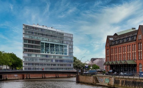 Glass office complex in Hamburg's Speicherstadt warehouse district, Germany